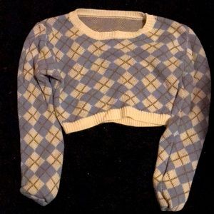 A medium Argyle Pattern Crop Sweater